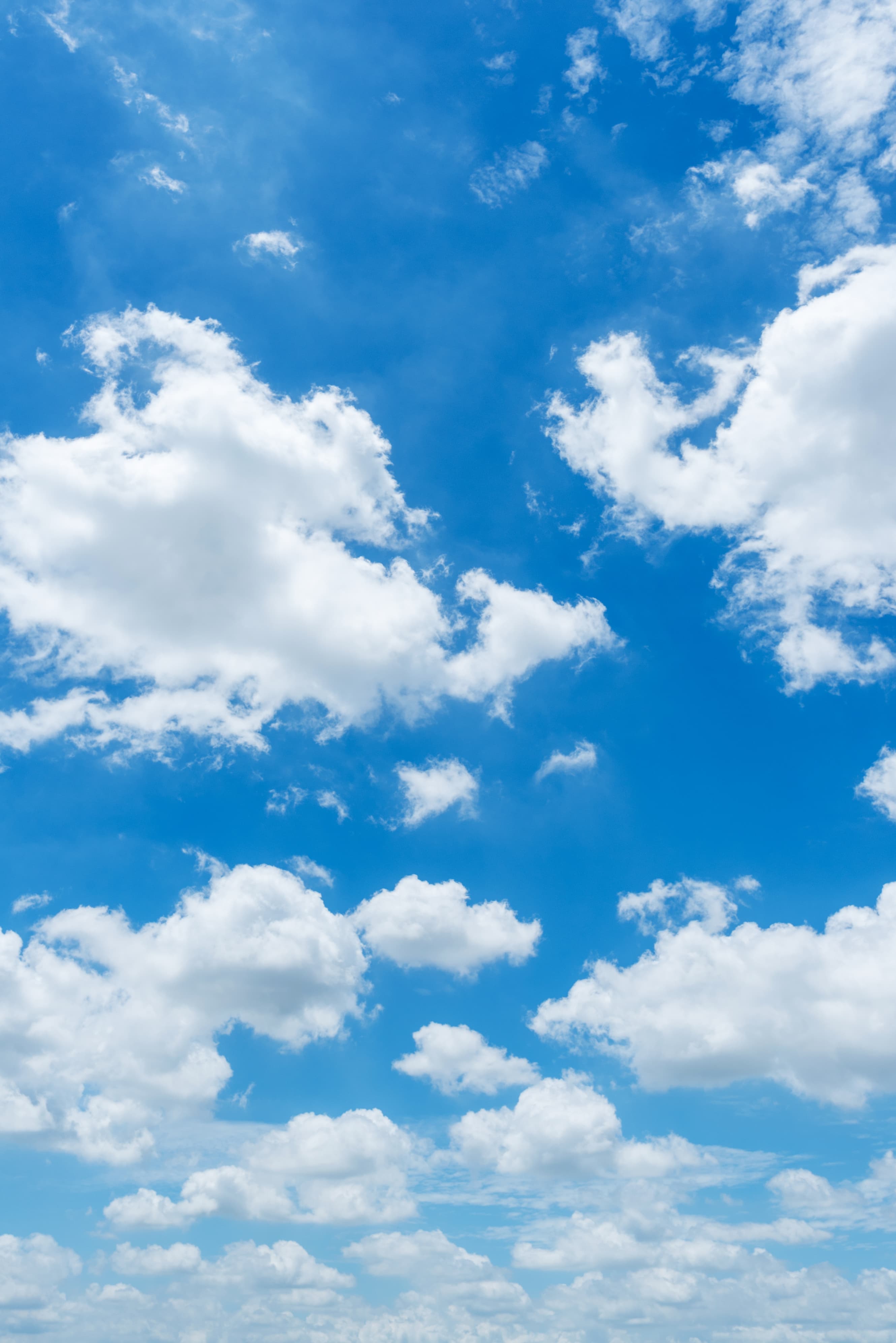 Fluffy clouds on a blue sky