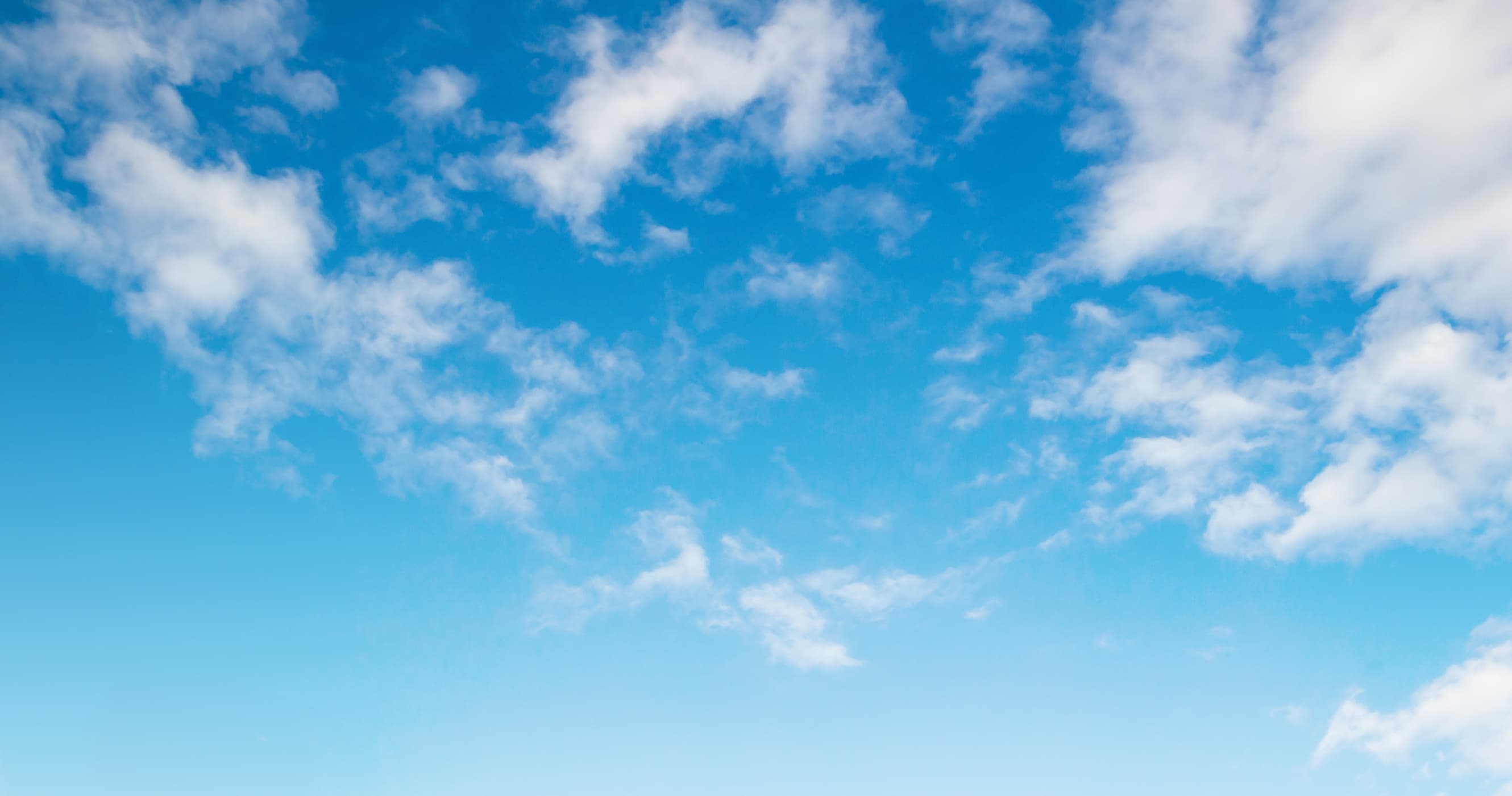 Fluffy clouds on a blue sky