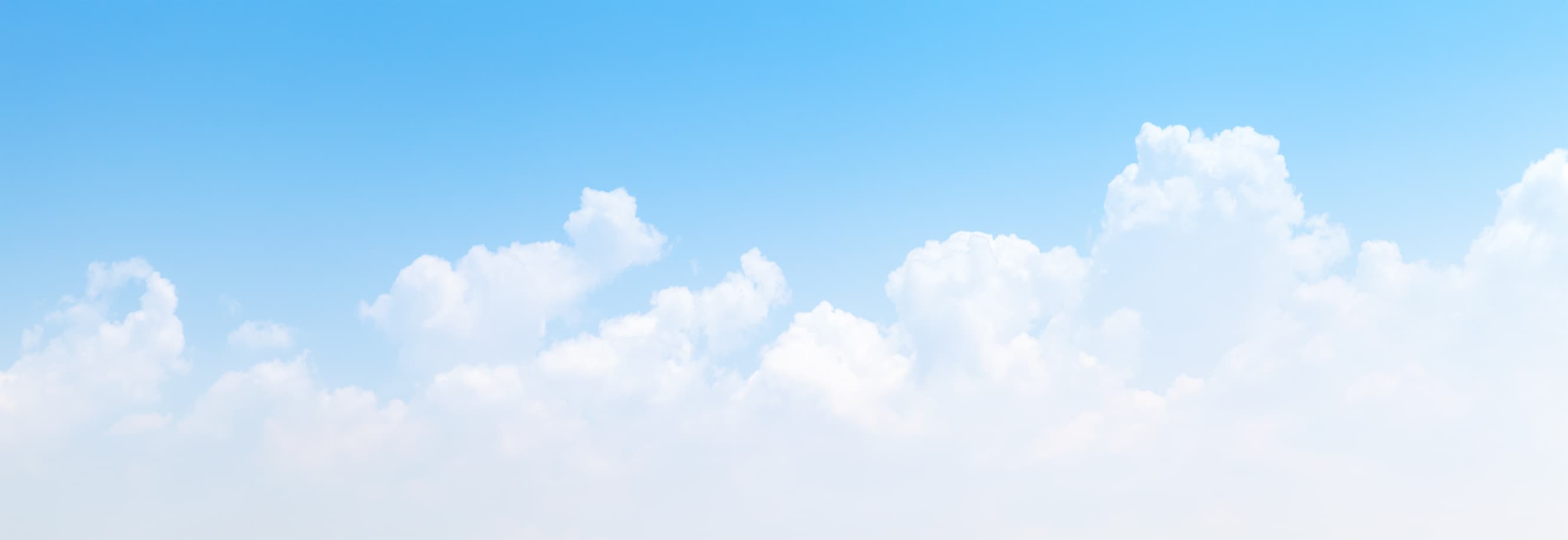 Fluffy Clouds in a blue sky